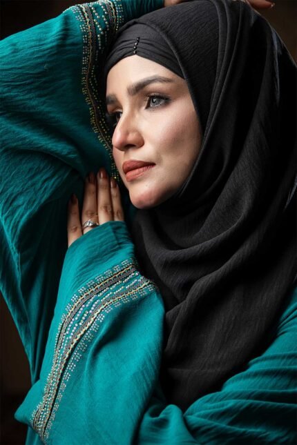 Exclusive Pastel Color Borka – Embroidery & Stone Work is a graceful and stylish modest wear piece. Designed in a soft pastel color, this borka features elegant embroidery and delicate stone embellishments that add a refined and sophisticated touch. Perfect for special occasions, Islamic gatherings, and festive events, it beautifully combines modesty, elegance, and premium craftsmanship.