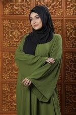 Olive Green Color Borka – Stone Work is a sophisticated and elegant modest wear piece. Crafted in rich olive green, this borka features intricate stone embellishments that add a stylish and refined touch. Perfect for special occasions, Islamic gatherings, and festive events, it blends modesty, elegance, and high-quality craftsmanship.