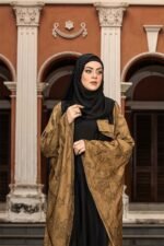 Olive & Black Color Abaya – Stone Work is a stylish and elegant modest wear piece. Designed in a classy olive and black color combination, this abaya features intricate stone embellishments that enhance its sophistication. Perfect for daily wear, Islamic gatherings, and special occasions, it blends modesty, modern style, and refined craftsmanship image