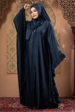 Dark Blue Color Abaya – Stone Work is a stylish and elegant modest wear piece designed for a graceful look. Crafted in rich dark blue, this abaya features delicate stone embellishments that add a touch of sophistication and shine. Perfect for daily wear, Islamic gatherings, and special occasions, it blends modesty, comfort, and modern elegance image