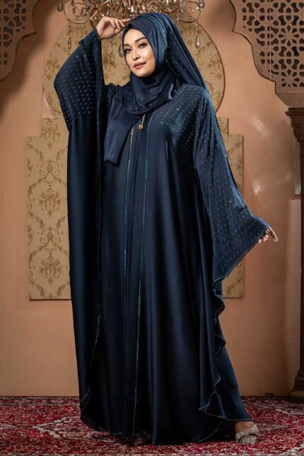 Dark Blue Color Abaya – Stone Work is a stylish and elegant modest wear piece designed for a graceful look. Crafted in rich dark blue, this abaya features delicate stone embellishments that add a touch of sophistication and shine. Perfect for daily wear, Islamic gatherings, and special occasions, it blends modesty, comfort, and modern elegance image