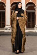 Olive & Black Color Abaya – Stone Work is a stylish and elegant modest wear piece. Designed in a classy olive and black color combination, this abaya features intricate stone embellishments that enhance its sophistication. Perfect for daily wear, Islamic gatherings, and special occasions, it blends modesty, modern style, and refined craftsmanship. image