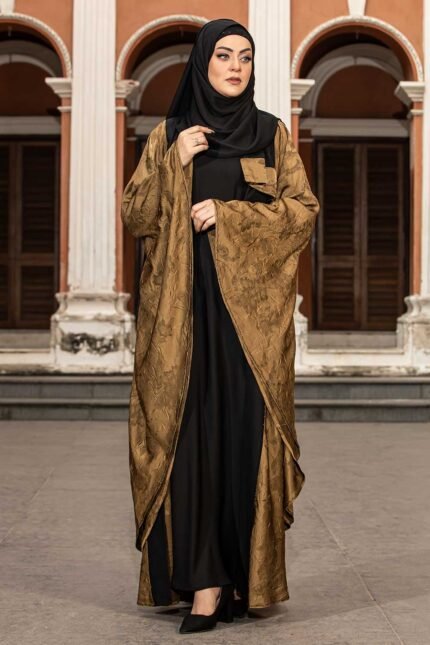 Olive & Black Color Abaya – Stone Work is a stylish and elegant modest wear piece. Designed in a classy olive and black color combination, this abaya features intricate stone embellishments that enhance its sophistication. Perfect for daily wear, Islamic gatherings, and special occasions, it blends modesty, modern style, and refined craftsmanship. image